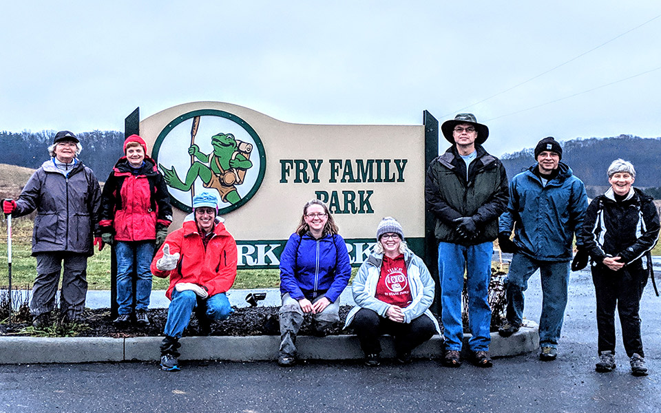 Group of Hikers at Fry Family Park Sign
